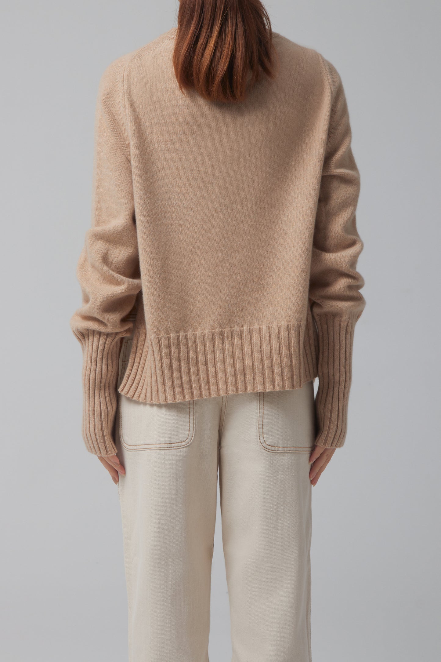 ASYMMETRIC ROUNDNECK JUMPER WITH SIDE SLITS