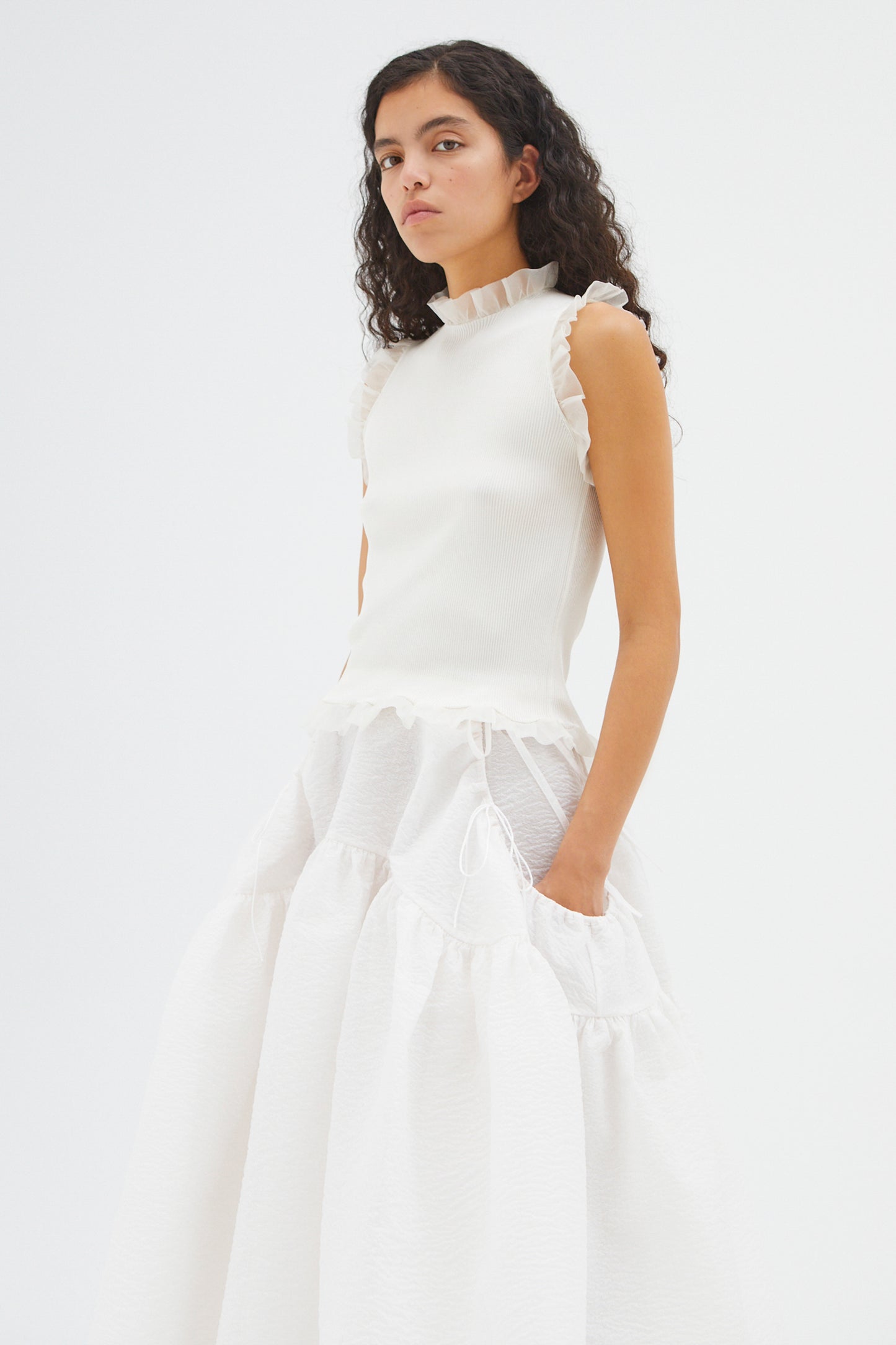 SLEEVELESS TOP WITH RUFFLED DETAILS