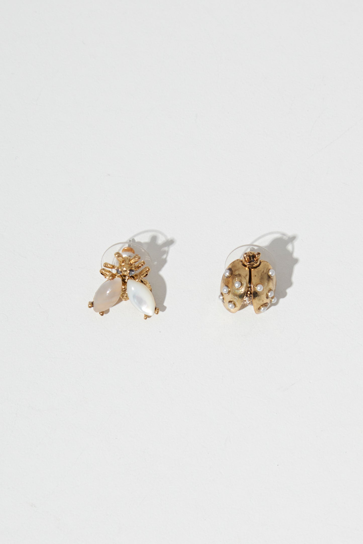 ASYMMETRIC LADYBUG EARRING